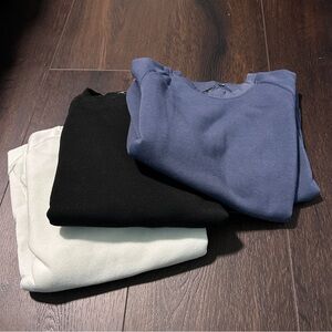 Black, Cream, and Blue Sweatshirts